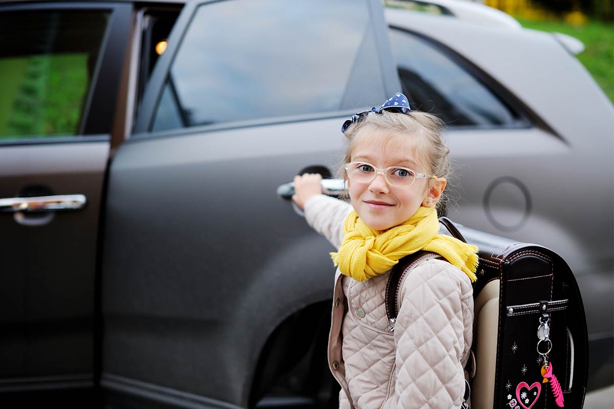 Girl opening car door