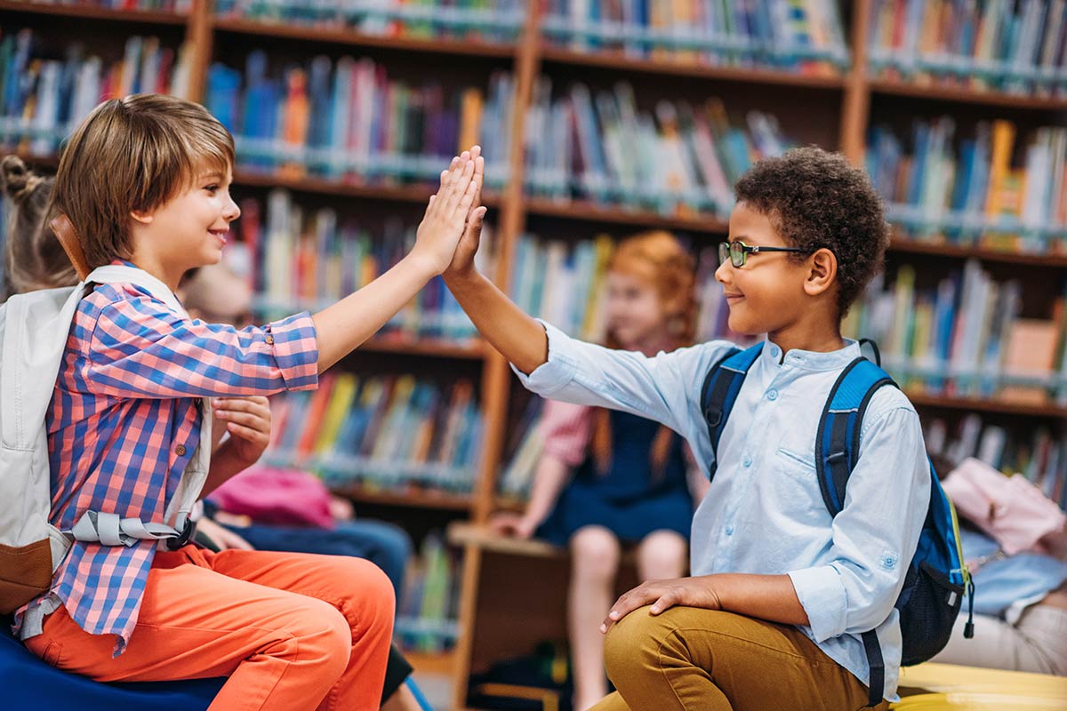 Students high-fiving